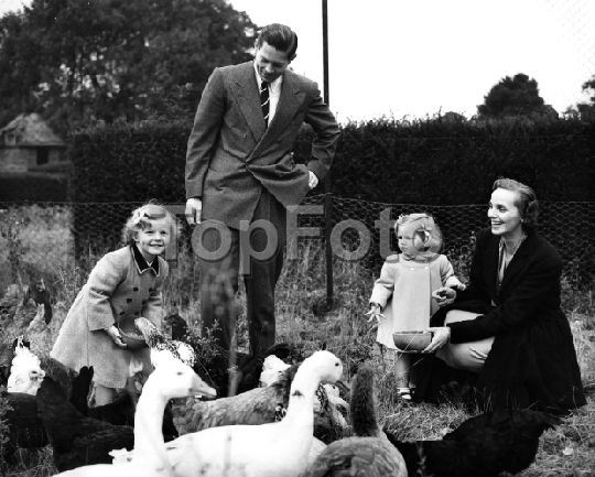 Royal exiles live in Shaw village Feeding the chickens and the ducks aided by their royal mother and father are Princess Margaret (3 1/2) and Princess Helen (2) , children of Ex-king Michael of Romania and Princess Anne of Bourbon Parma. This picture of the royal exiles was taken at Ayot House, Ayot St Lawrence , Herts , which they have rented from Lord Brocket . 24 September 1952