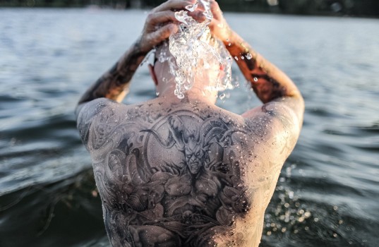 Close-Up Of Man In Lake - Creative #:748351815 Stanislav Simtsenko / EyeEm / Getty Images