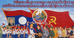 Laos: Revolutionary Socialist realist-style political poster on the streets of Vientiane © David Henley / Pictures From History