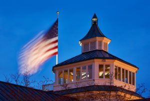 Stars and Stripes flying over the Carriage House of Trump Winery at dusk. Charlottesville, Virginia, USA. ©CEPHAS / Mick Rock