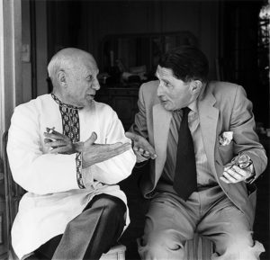 Picasso and Roland Penrose speaking French, Villa la Californie, Cannes, France 1956 © Lee Miller Archives