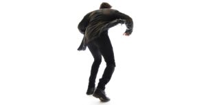 A Figurestock image of a mystery man in a jacket, running – shot from low level.
