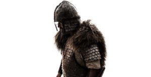 A semi-silhouette of a wealthy Viking in armour and fur – shot from eye level.