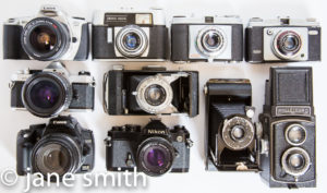 a collection of analog cameras