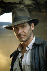 American actor Harrison Ford on the set of 'Indiana Jones and the Temple of Doom', directed by Steven Spielberg, 1984.